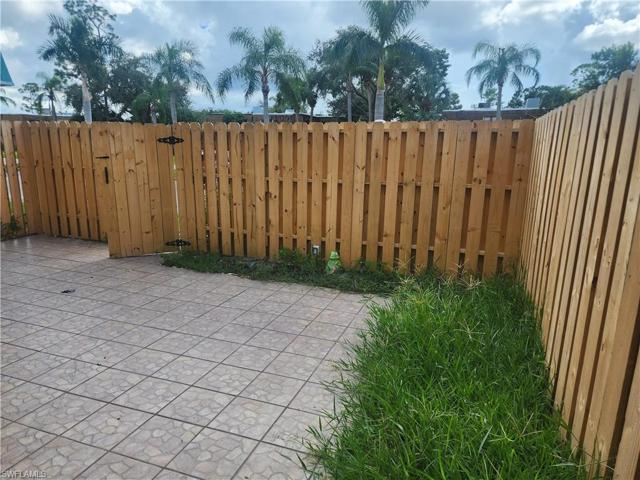 New Fence and Gate Surrounds the Courtyard