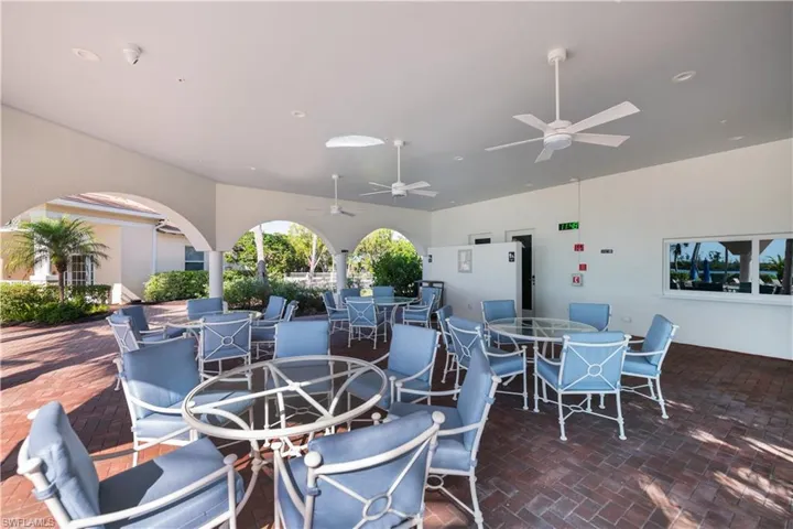 View of patio / terrace with outdoor dining area and ceiling fan