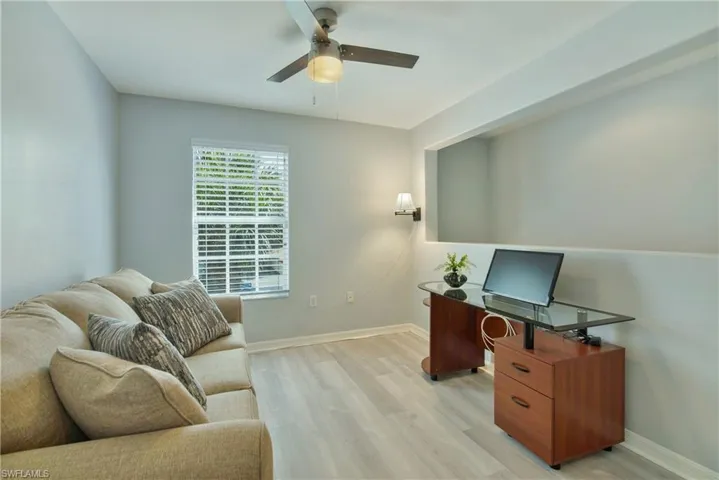 Office featuring light wood-type flooring and ceiling fan