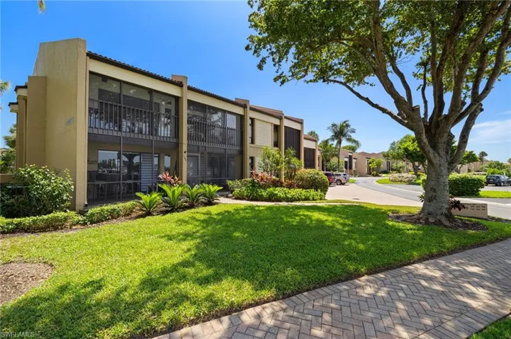 Surrounding community featuring a yard and a residential view