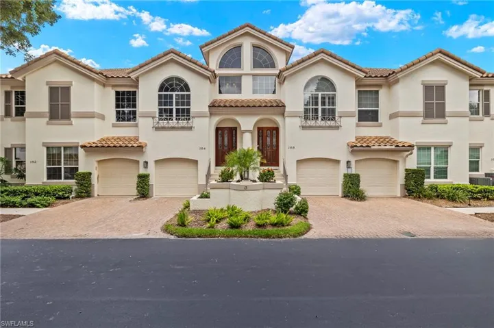 Mediterranean / spanish-style house featuring a garage