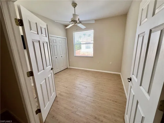 This room can be either an extra bedroom or a den.