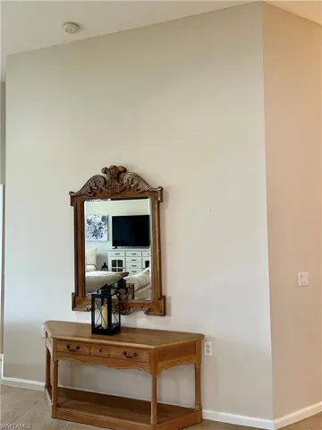 Mirror and table just off living room