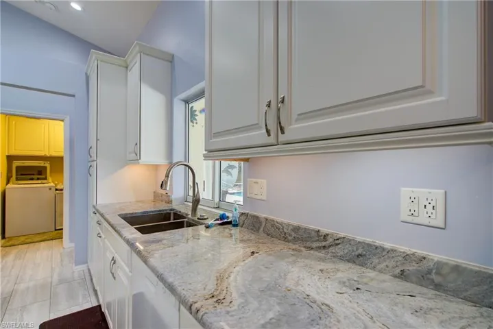 The beautiful granite countertop is rich with natural variations