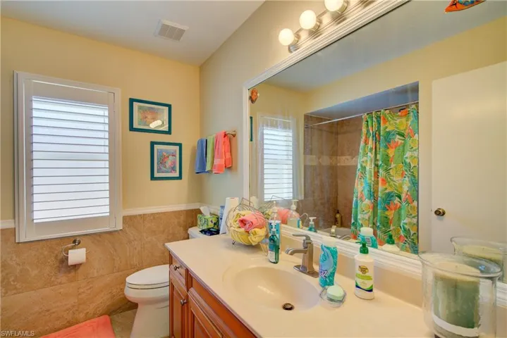 Lovely tile runs up the wall, keeping it nice and dry, and easy to clean