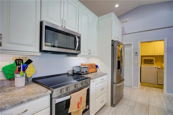 The large tile flooring is nice & bright, and easy to clean