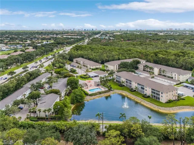 Aerial perspective showcasing a residential community with multiple multi-story buildings