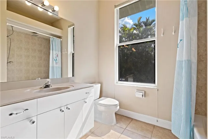 Full bathroom with shower / bathtub combination