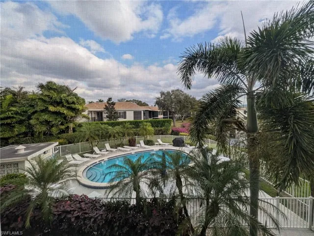 Community pool with a patio area