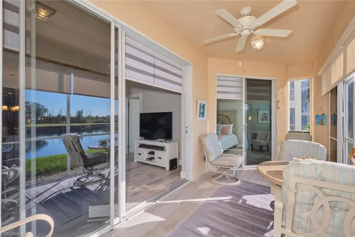 Sunroom featuring ceiling fan and a healthy amount of sunlight