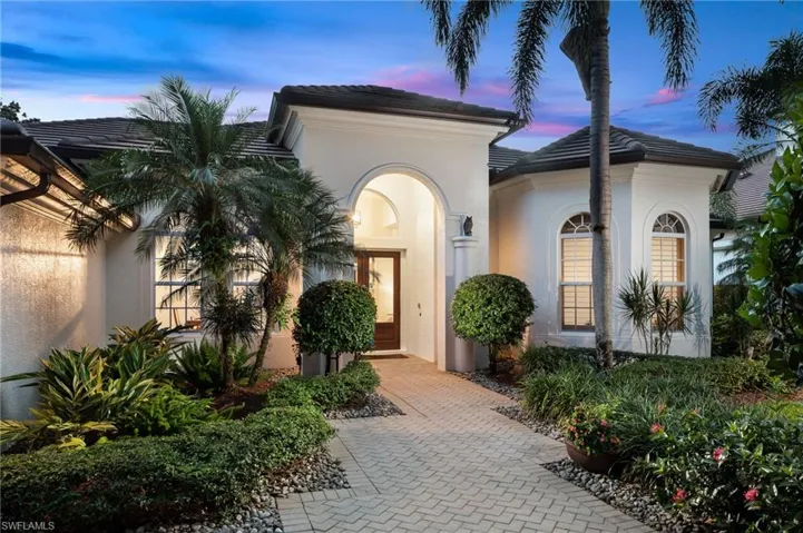 View of front of home featuring stucco siding