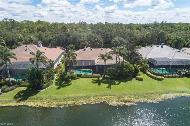 View of subject property featuring a large body of water