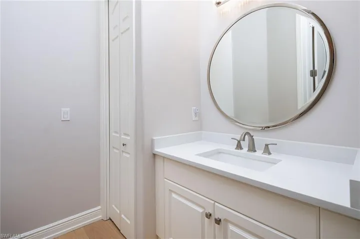 Bathroom featuring vanity and light wood-style flooring