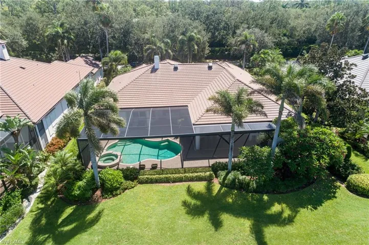 View from above of property featuring a pool