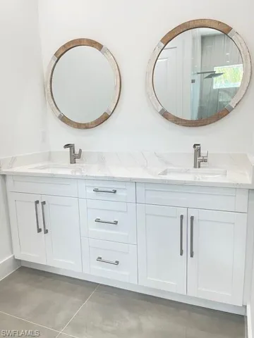 Bathroom with walk in shower and vanity