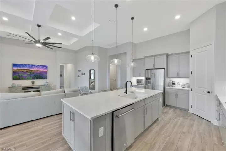 upgraded large kitchen island with quartz countertops