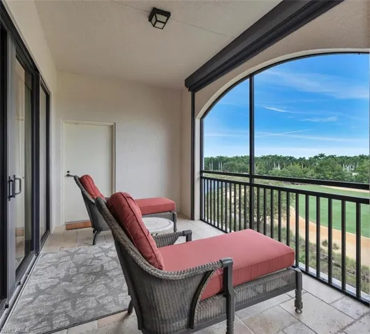 Master bedroom balcony with water & golf course views.