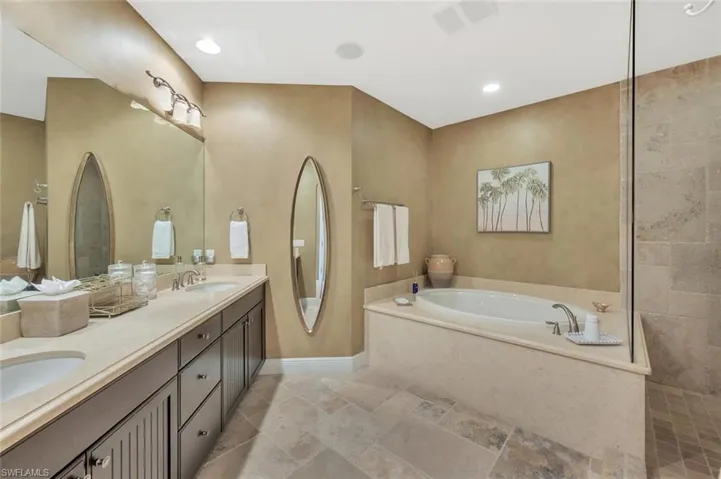 Dual sinks, soaking tub plus walk-in shower.