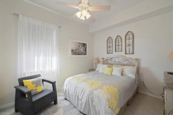 Bedroom featuring baseboards and a ceiling fan