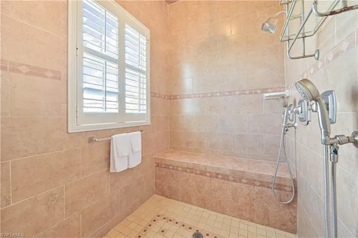 Bathroom with tiled shower