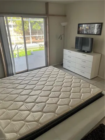 Bedroom featuring access to outside