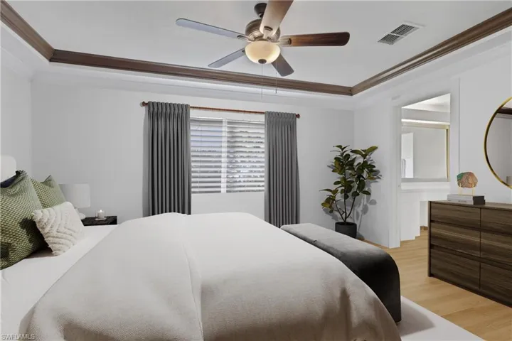 Photo includes reality renovation and/or staging to showcase the possibility of the Primary Bedroom. Design services included with purchase!