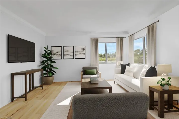 Photo includes reality renovation and/or staging to showcase the possibility of the Living Room. Design services included with purchase!
