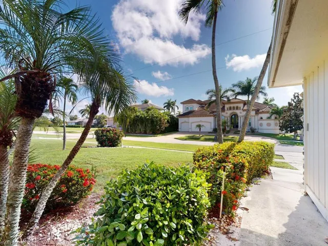 View of yard featuring a garage