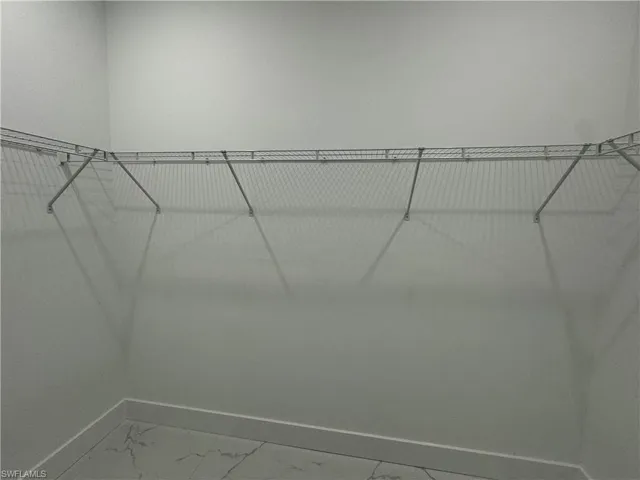 Spacious 'His" closet