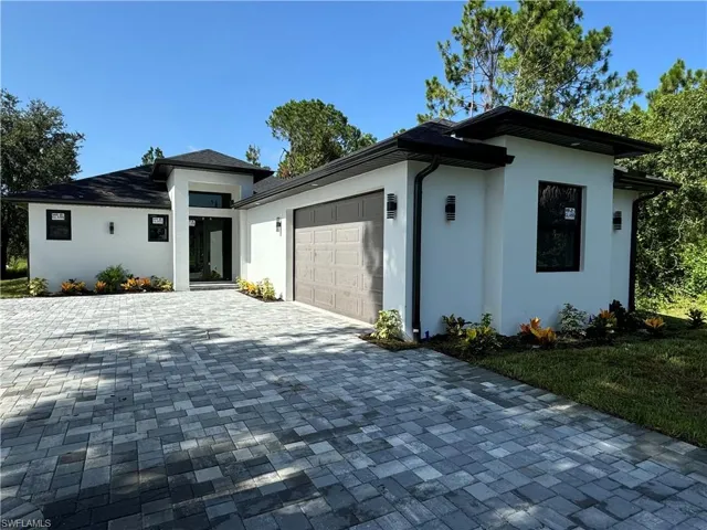 View of front of home featuring the double car garage