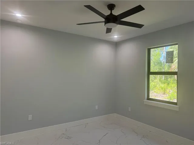 3rd room with an abundant amount of sunlight and ceiling fan