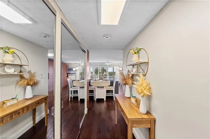 Double mirrored closets in entry