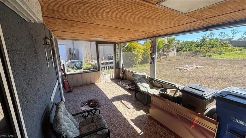 Sunroom featuring healthy amount of natural light