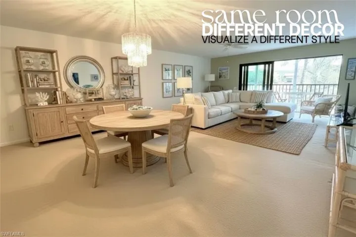 Dining area with light colored carpet and a chandelier