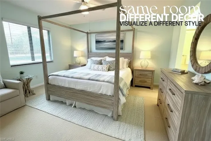 Bedroom with a ceiling fan and light carpet