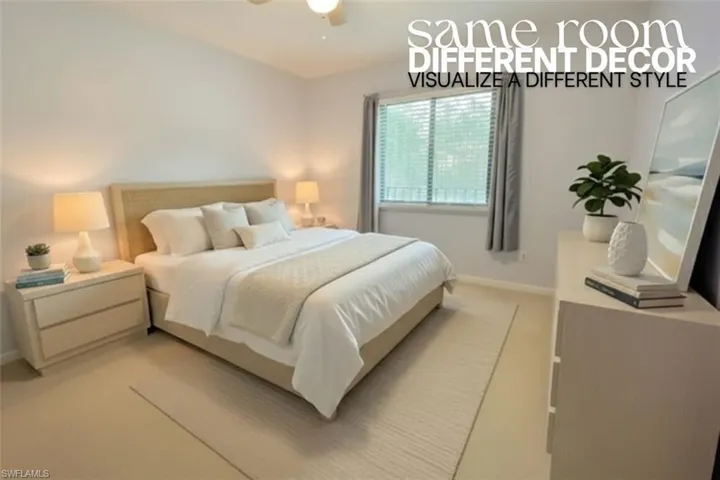 Carpeted bedroom with ceiling fan and baseboards
