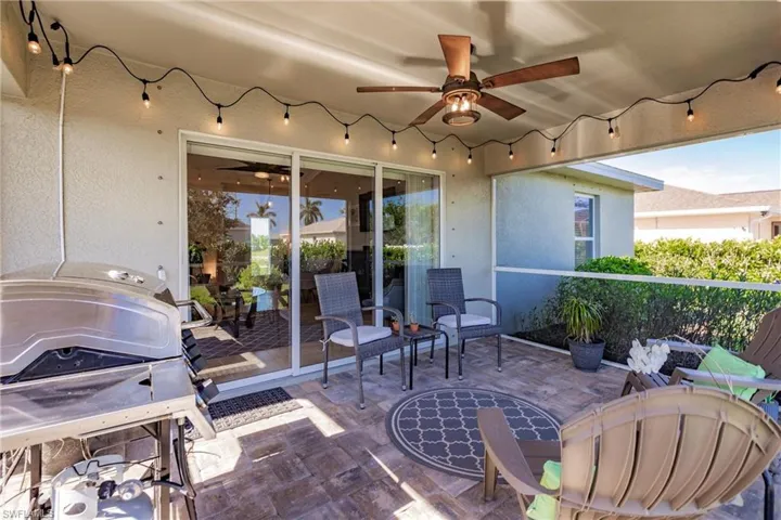 View of terrace featuring ceiling fan