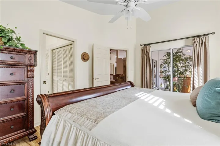 Bedroom featuring light wood-type flooring and ceiling fan