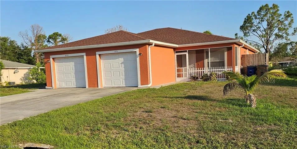 Single story home featuring stucco siding and concrete driveway