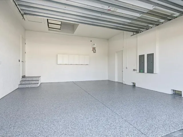 Garage featuring electric panel