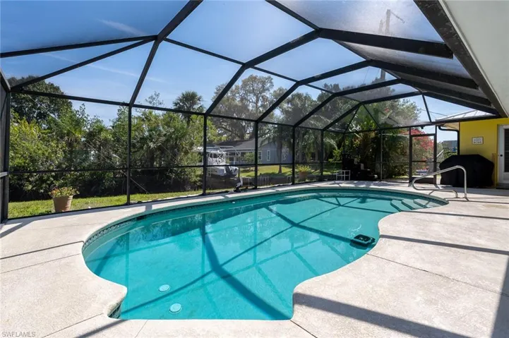 Large Outdoor gunite pool with plenty of room for sun bathing and entertaining by the water.
