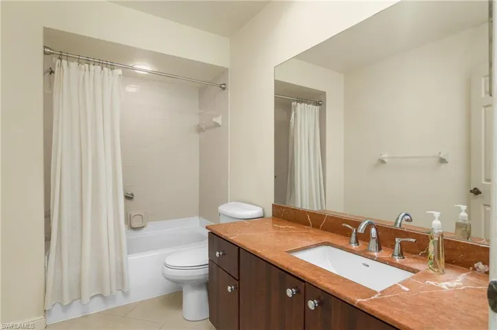 Bathroom with vanity and shower/tub combo