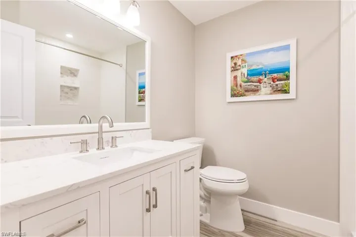 Guest bathroom with white vanity