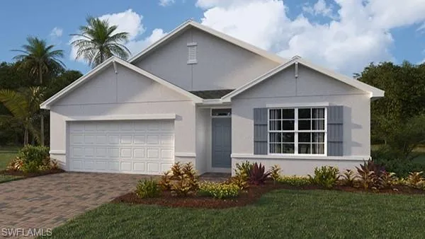 View of front of property with an attached garage, stucco siding, decorative driveway, and a front yard