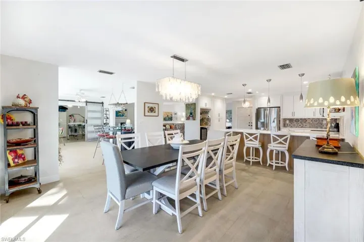 Kitchen and formal dining area are open to one another.