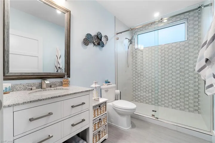 Downstairs Level Full Pool Bath with Walk-In Shower