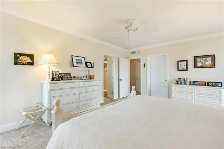 Master bedroom featuring crown molding