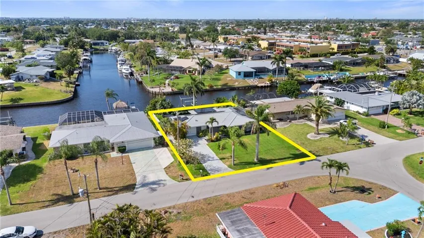 Aerial view featuring a water view and a residential view  - Virtually Edited Image