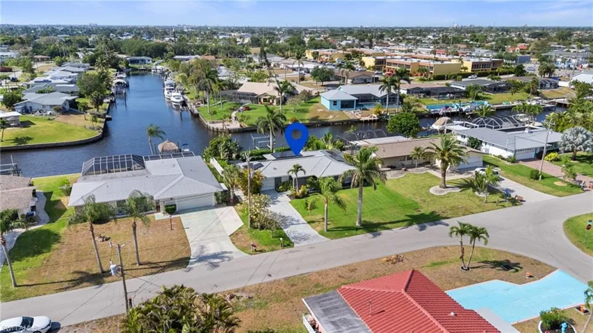 Drone / aerial view featuring a water view and a residential view  - Virtually Edited Image