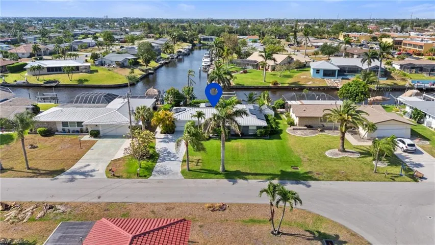 Aerial view featuring a residential view and a water view  - Virtually Edited Image